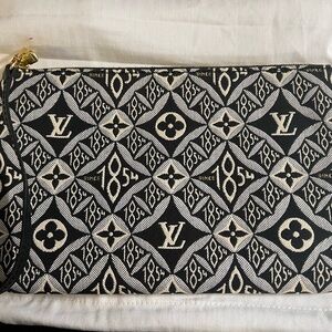 Louis Vuitton Neverfull Since 1854 wristlet pouch